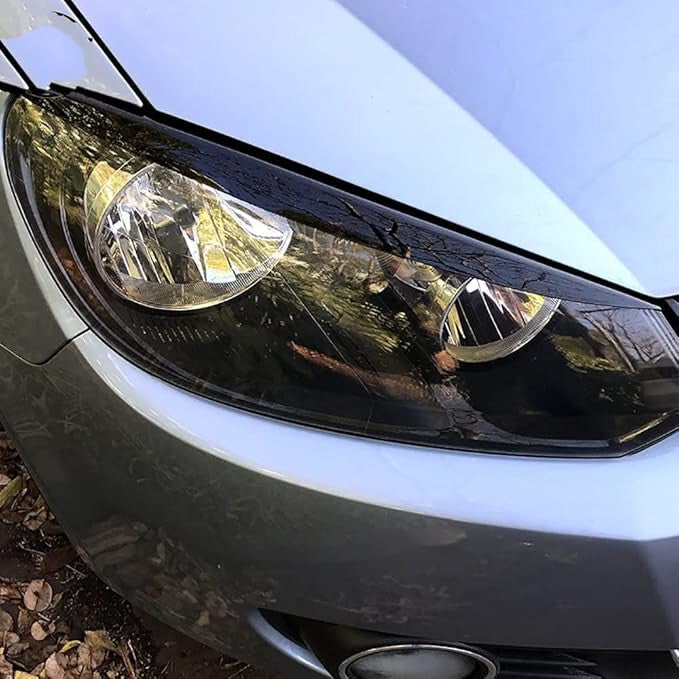 Fényszóró lámpadísz VW-hez fekete színben